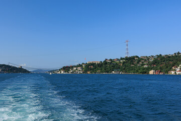 Turquoise blue sea water. View of the Bosphorus in Istanbul city on sunny summer day, in a public...