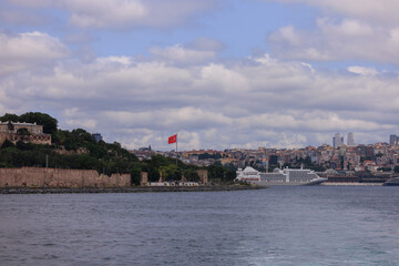 Turquoise blue sea water. View of the Bosphorus in Istanbul city on sunny summer day, in a public...