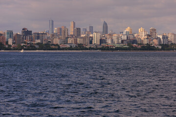 Fototapeta premium Turquoise blue sea water. View of the Bosphorus in Istanbul city on sunny summer day, in a public place.