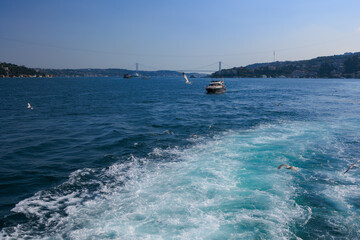 Turquoise blue sea water. View of the Bosphorus in Istanbul city on sunny summer day, in a public place.