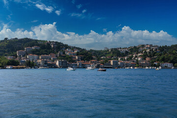 Fototapeta premium Turquoise blue sea water. View of the Bosphorus in Istanbul city on sunny summer day, in a public place.