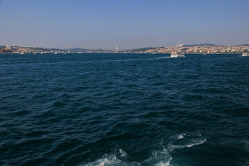 Turquoise blue sea water. View of the Bosphorus in Istanbul city on sunny summer day, in a public...