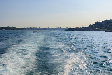 Turquoise blue sea water. View of the Bosphorus in Istanbul city on sunny summer day, in a public...