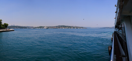 Turquoise blue sea water. View of the Bosphorus in Istanbul city on sunny summer day, in a public place.