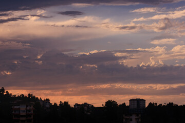 Orange sky at sunset in the evening. Silhouette and outlines of the buildings. Evening views of buildings of the city of Istanbul.