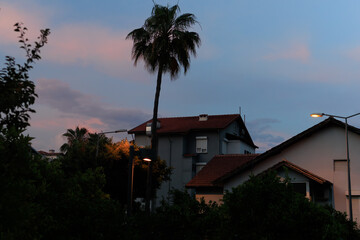 Orange sky at sunset in the evening. Silhouette and outlines of the buildings. Evening views of buildings of the city of Istanbul.
