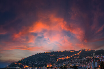 Orange sky at sunset in the evening. Silhouette and outlines of the buildings. Evening views of buildings of the city of Istanbul.