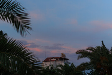 Orange sky at sunset in the evening. Silhouette and outlines of the buildings. Evening views of buildings of the city of Istanbul.
