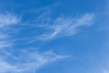 The sky is blue and clear with a few clouds scattered throughout