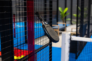 Paddle tennis objects and court.