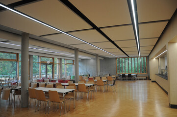 German school Modern school canteen with chairs and tables