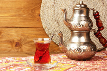 Black tea in armudu glass
