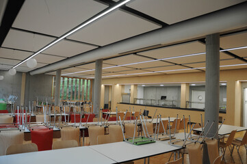 German school Modern school canteen with chairs and tables
