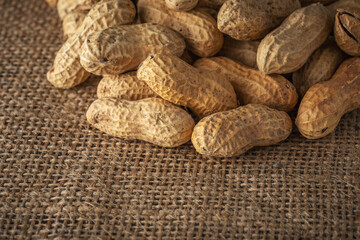 Close-up view of peanut in sack bag. Food background.