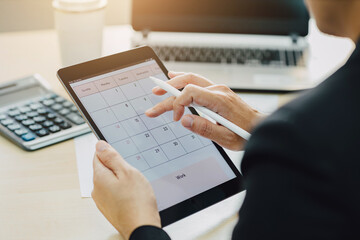 Businessman checking calender planner schedule organization management remind on tablet. Concept of...