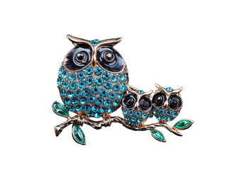 This brooch features an adorable owl family adorned with sparkling crystals