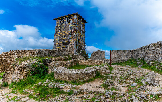 A view over the watch tower and church ruins on the upper levels of  the Castle at Kruja, Albania in summertime