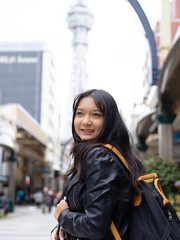 Travel lifestyle urban city, beautiful young girl tourist in Osaka Japan.
