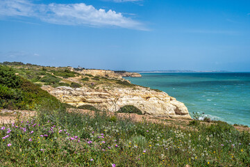Portuguese coast in Benagil, Algarve, Portugal. Praia do Carvalho. Seven Hangging Valleys Trail.