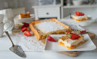 Homemade cheesecake with apricots on a table
