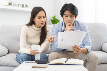 Family financial concept, Stressed wife and husband have a problem to pay loan can not pay credit...