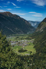Fototapeta premium Hiking in the Austrian Alps. Hiking in the mountains. Serpentine road in the mountains