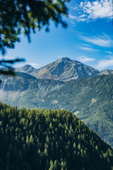 Hiking in the Austrian Alps. Hiking in the mountains. Serpentine road in the mountains