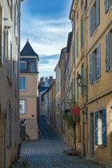Cluny in France, colorful houses, small street in Burgundy
