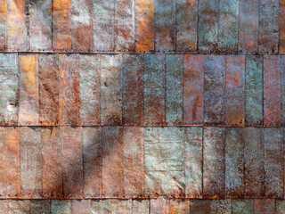 Abstract shapes of tin siding on an old shack