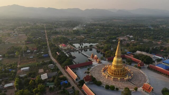Beautiful aerial view of Phra Mahathat Chedi Sri Wiang Chai one of the biggest pagoda in Thailand, with the base of about 1,600 square metres located in Li district, Lamphun province.