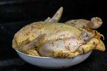Classic seasoned chicken isolated and in selective focus