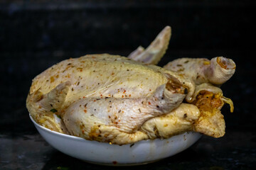 Classic seasoned chicken isolated and in selective focus