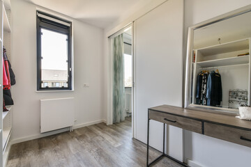 Bright and well-organized walk-in closet in modern home