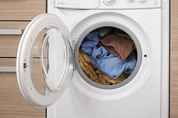 Close-up of a built-in washing machine in a home kitchen.