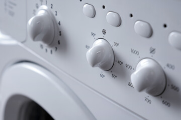 Close-up of the control panel of a washing machine.