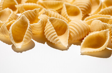 Conchiglie Rigate raw pasta close-up texture