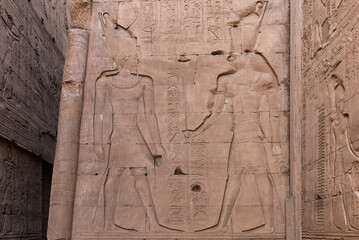 wall Reliefs at the Temple of Edfu at Aswan Egypt.