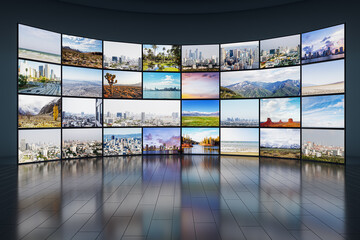 Creative video wall in television production room as technology concept with colorful screens and...