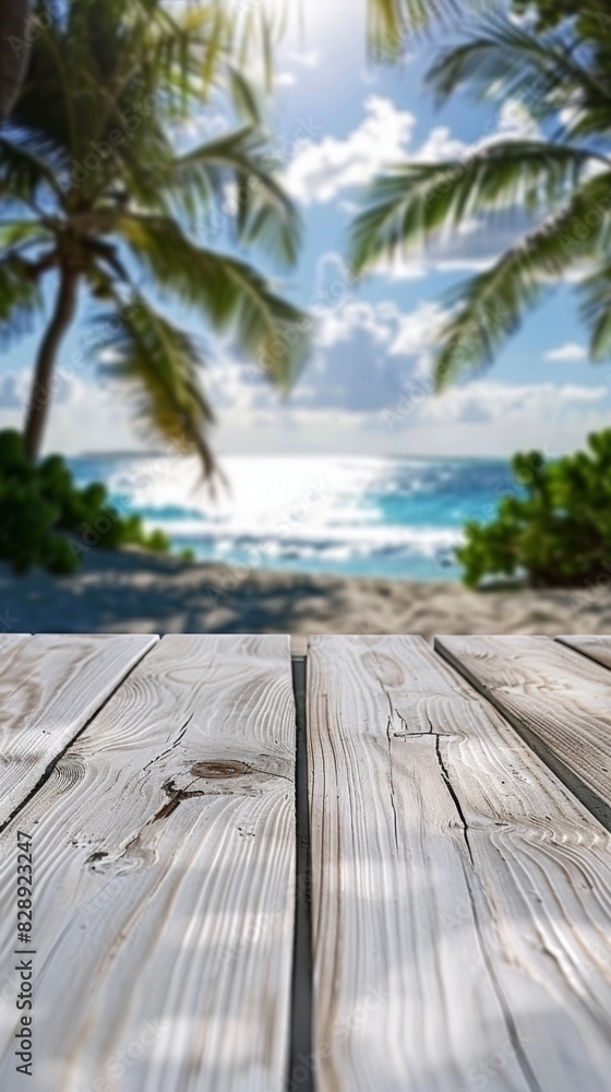 Poster a white wooden table set against a stunning view of the ocean with swaying palm trees in the backgro