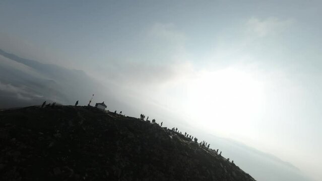 Mountain peaks during sunrise, Chandrashila peak at 12110 ft above sea level. Amazing landscapes. World's highest Shiva temple India. FPV arial shots of mountain peaks.