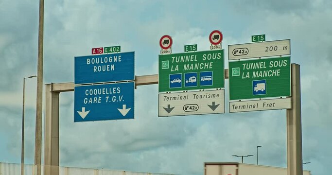Guiding to La Manche: Road Signs in View