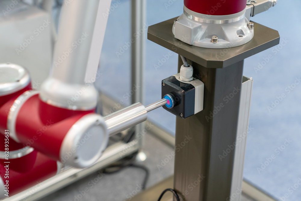 Aufkleber Industrial Robot presses the button. Accuracy calibration.
