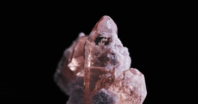 sherry colored topaz footage isolated on black background. Topaz moutain, Utah, USA. macro detail close-up rough raw unpolished semi-precious gemstone. 