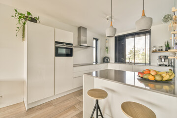 Modern kitchen interior with natural light at Duintopstraat
