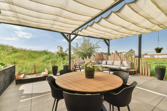 Cozy backyard setup with furniture and canopy