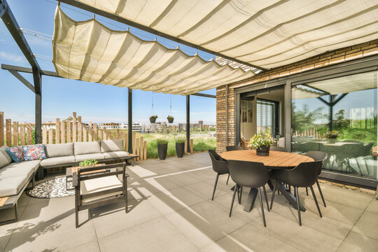 Spacious terrace with stylish furniture at Duintopstraat