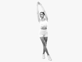 Beautiful attractive girl in white shorts and a top on a white background. The concept of sports and healthy lifestyle.