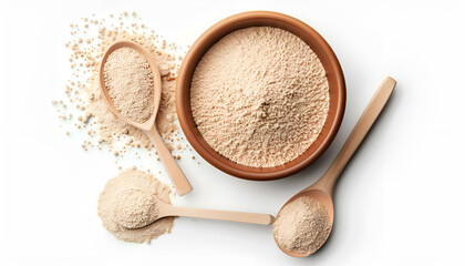 Bowl and spoon with active dry yeast isolated on white, top view