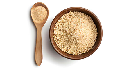 Bowl and spoon with active dry yeast isolated on white, top view