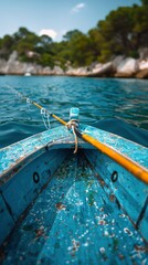 Blue Boat With Yellow Handle in Water